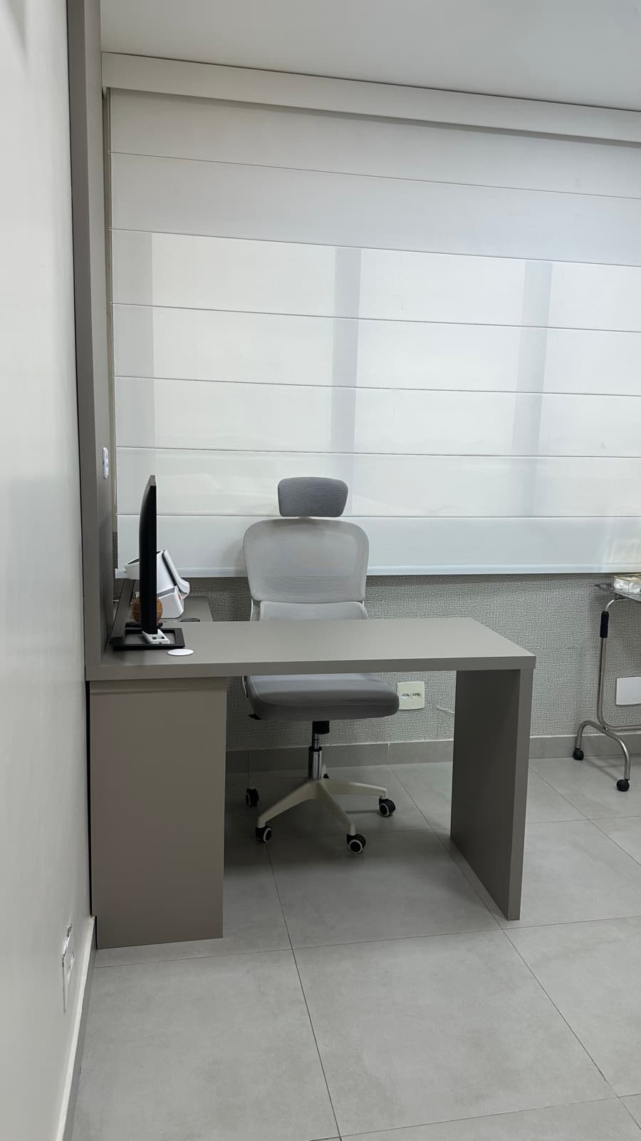 Sala de procedimentos — área clínica para exame físico e bioimpedância